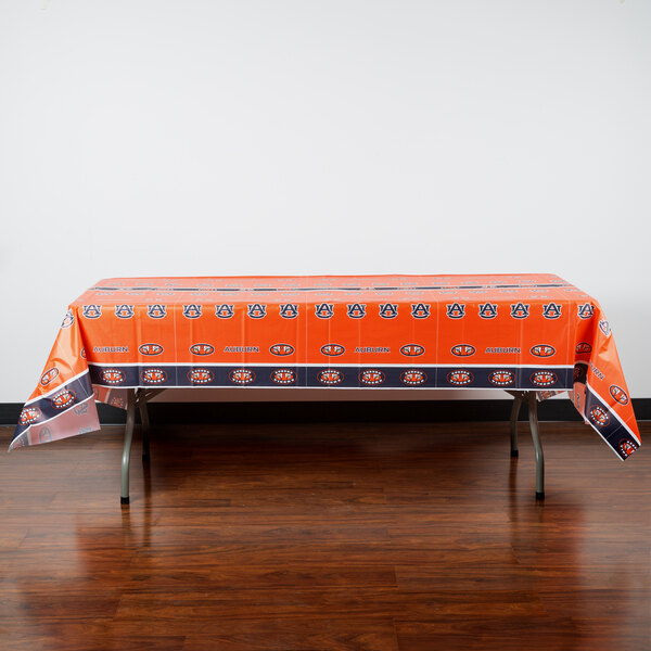 An Auburn University plastic table cover on a table.