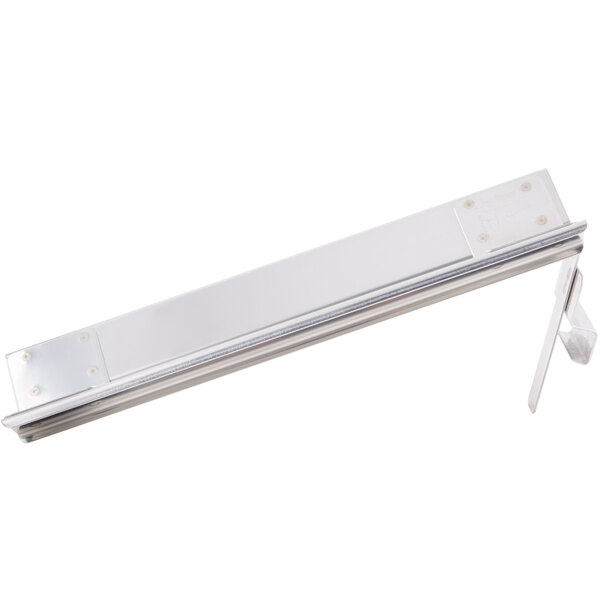 A close-up of a Bron Coucke stainless steel egg separator.