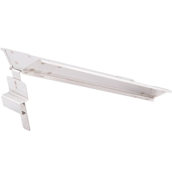 A stainless steel Bron Coucke egg separator on a metal shelf.