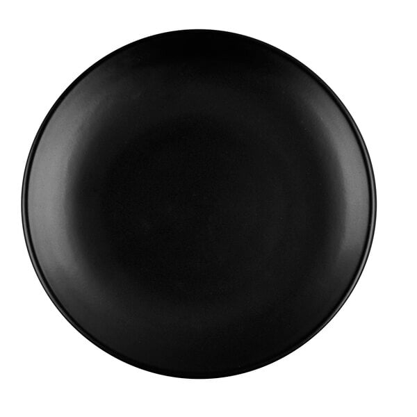 A close up of a black Libbey Driftstone porcelain coupe plate with a matte finish.
