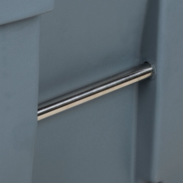 A Rubbermaid grey rectangular trash can with a metal handle.