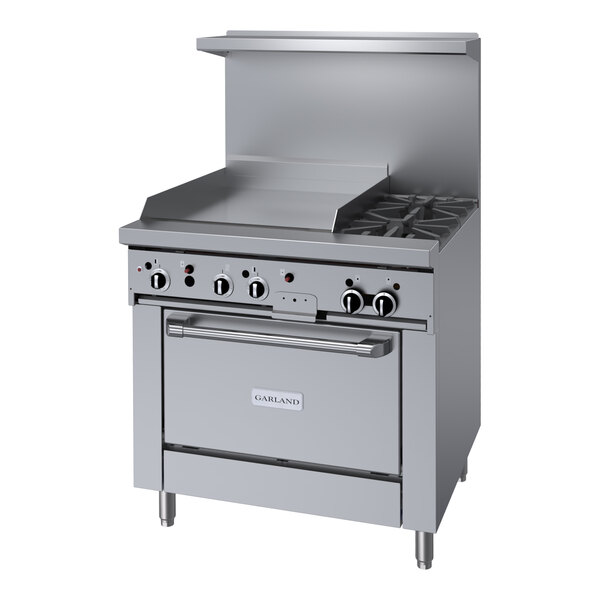 A stainless steel Garland commercial gas range with two burners.