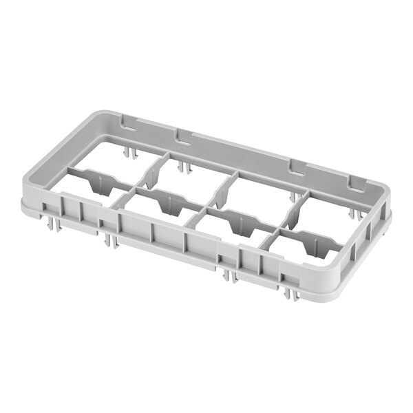 A soft gray plastic rack extender with eight compartments designed for use with dishwashing racks.