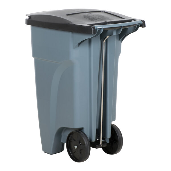 A grey Rubbermaid commercial trash can with black wheels and a black lid.