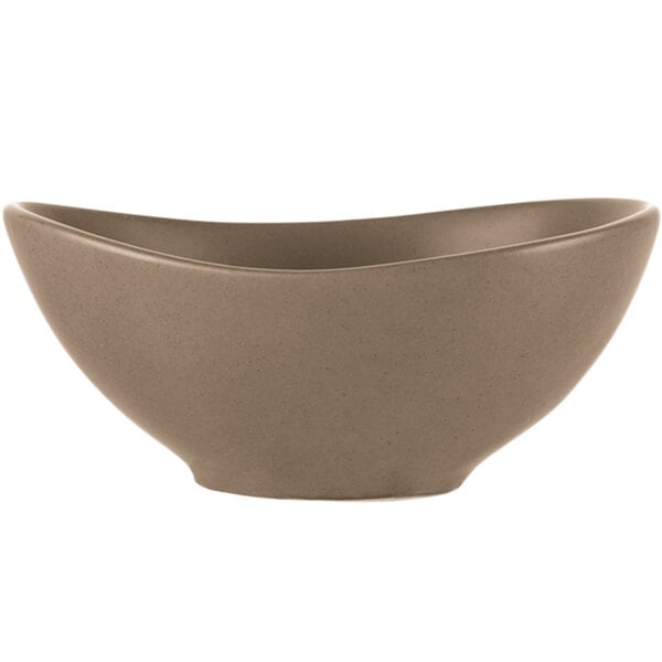 A close-up of a Libbey Driftstone sand satin porcelain bowl with a curved shape.