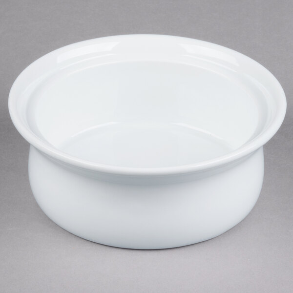 A white Libbey porcelain casserole dish on a gray surface.