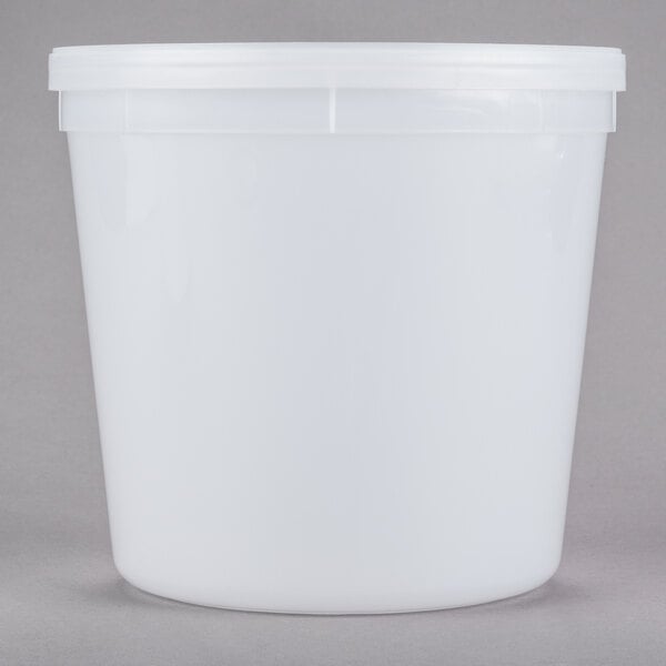 A white translucent round deli container with a lid.