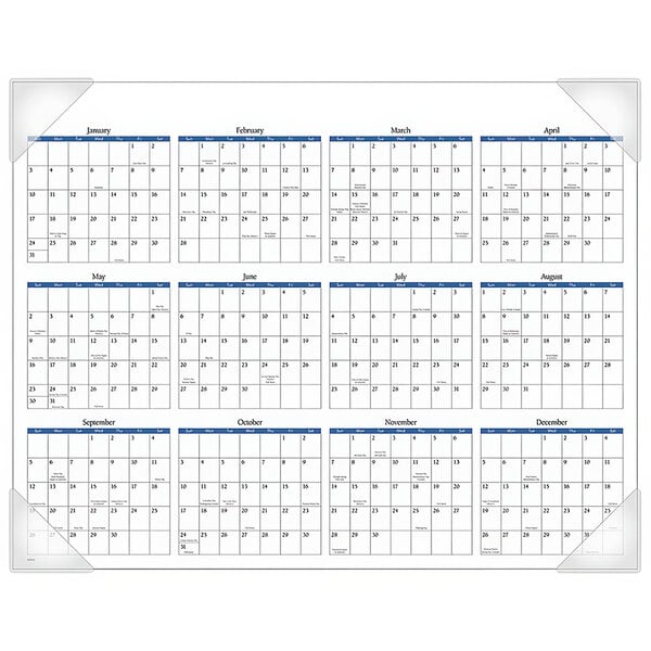 An At-A-Glance desk pad calendar with blue and white squares and clear corners.