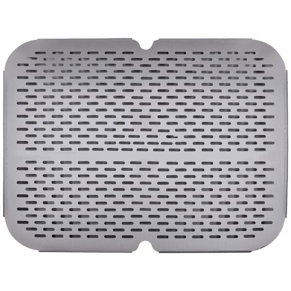 A silver grate with holes.