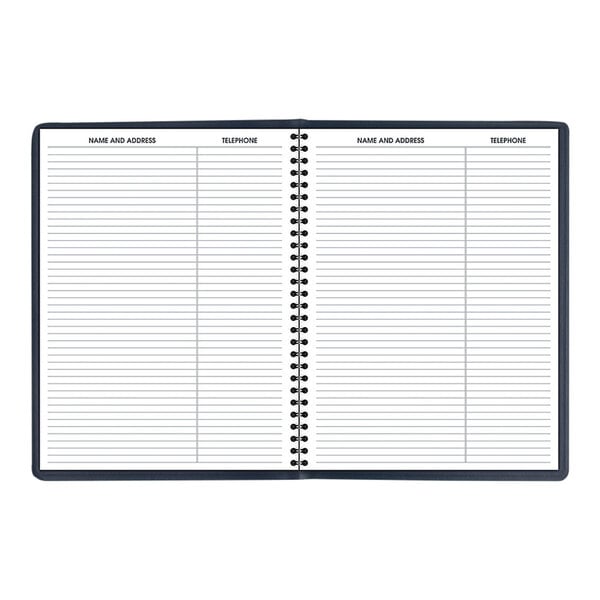 A navy At-A-Glance weekly appointment book with spiral binding and lined pages.