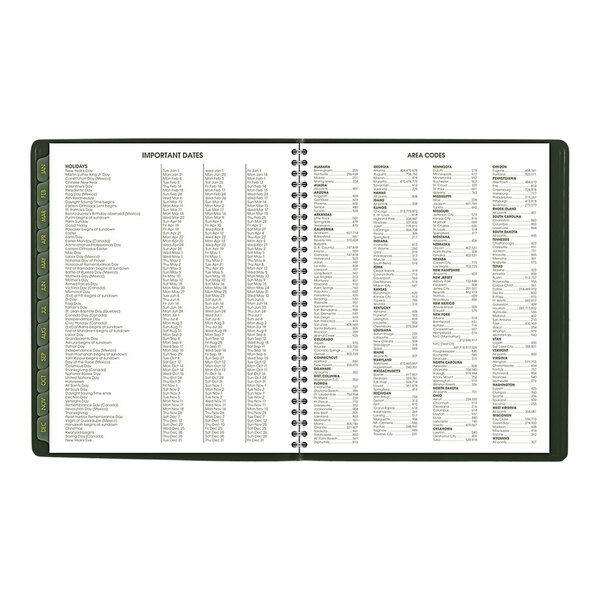 A close-up of the At-A-Glance green spiral bound monthly planner cover.