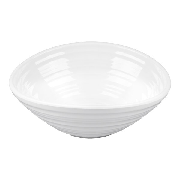A white oblong melamine bowl with a swirl pattern.