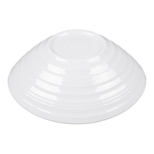 A white oblong melamine bowl with a swirl design, shown upside down.