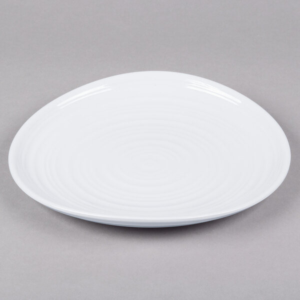 A white Elite Global Solutions melamine plate with a spiral design.