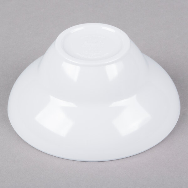 a white plate with a fork