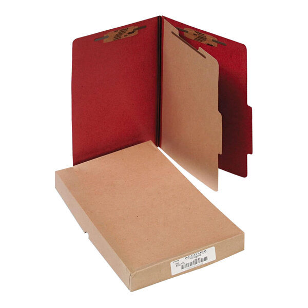 A brown box with a white label containing 10 red Acco legal size classification folders.