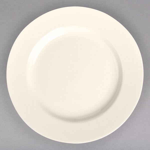 A Homer Laughlin ivory china plate with rolled edges.