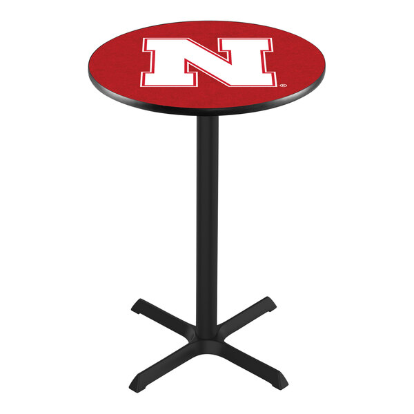 A round counter height pub table with a red top featuring a large white 'N' logo and a black pedestal base.