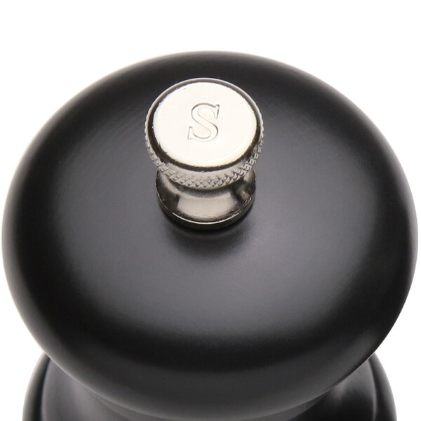 A Chef Specialties Capstan Ebony salt mill with a silver cap.