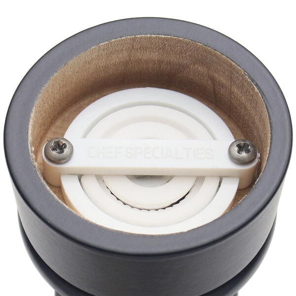 A close up of a Chef Specialties Capstan Ebony salt mill.