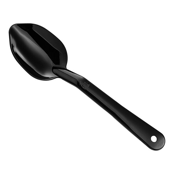 A black Carlisle 11" Polycarbonate solid serving spoon with a long handle.