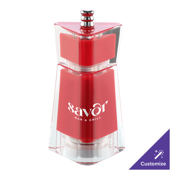 A red and clear Chef Specialties Kate pepper mill with the word "Savor" on it.