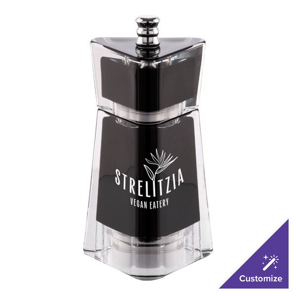 A black and clear Chef Specialties salt or pepper mill with a silver lid.