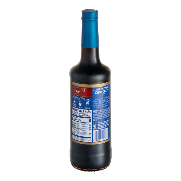 A close up of a Torani Sugar-Free Chocolate Flavoring Syrup bottle with a label.