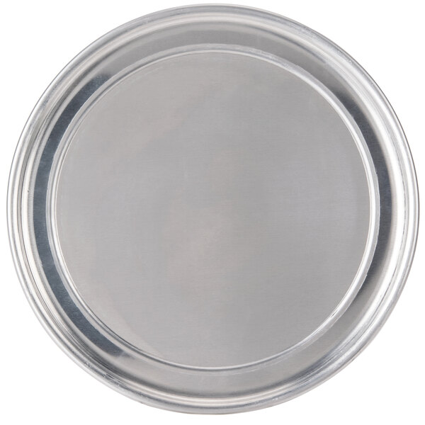 An American Metalcraft heavy weight aluminum pizza pan with a round surface.