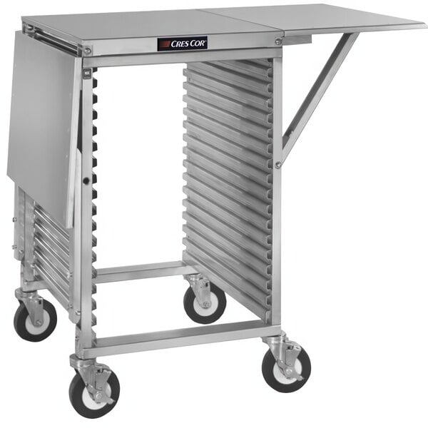 A silver Cres Cor sheet pan rack cart with stainless steel top and drop shelves.