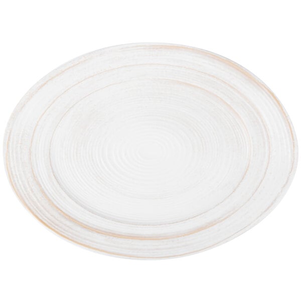 An off white melamine tray with a thin rim and a circular design.