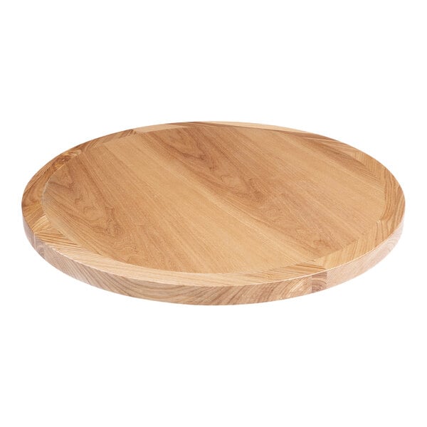 A BFM Seating round natural ash veneer table top.