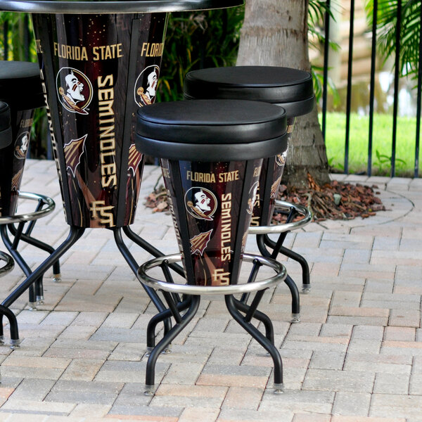 A close-up of a tall black Holland Bar Stool with Florida State University logo on the seat.