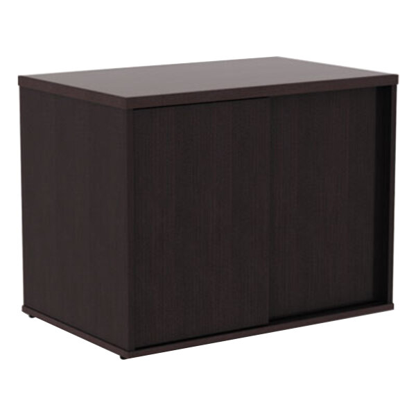 An espresso Alera low storage cabinet with doors.