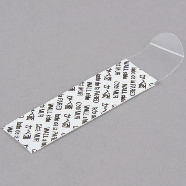 A white rectangular package with a black and white Command label.