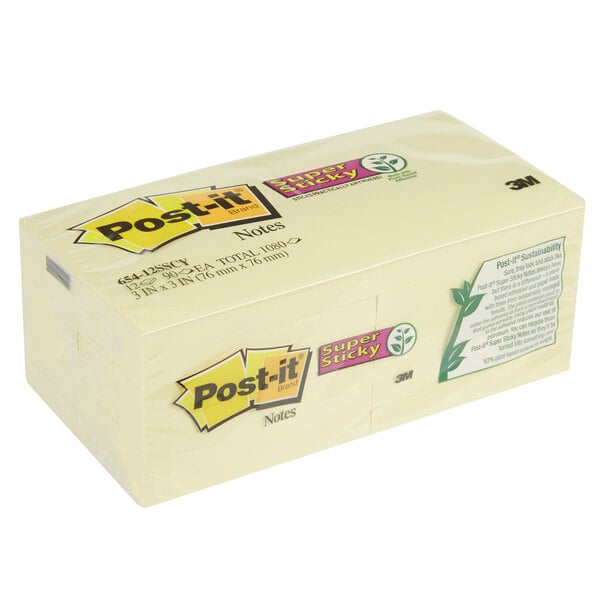 A box of 12 3M Post-It super sticky note pads in yellow packaging.