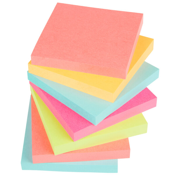 a close up of several colored paper