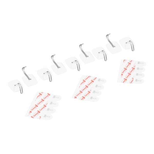 A pack of nine small white wire hooks with adhesive strips for wall mounting.