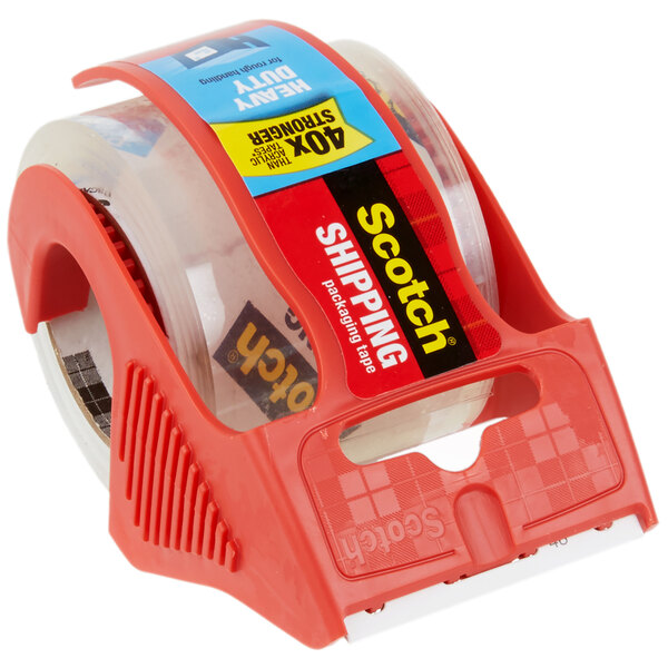 A roll of 3M Scotch heavy-duty packaging tape in a red and clear dispenser.