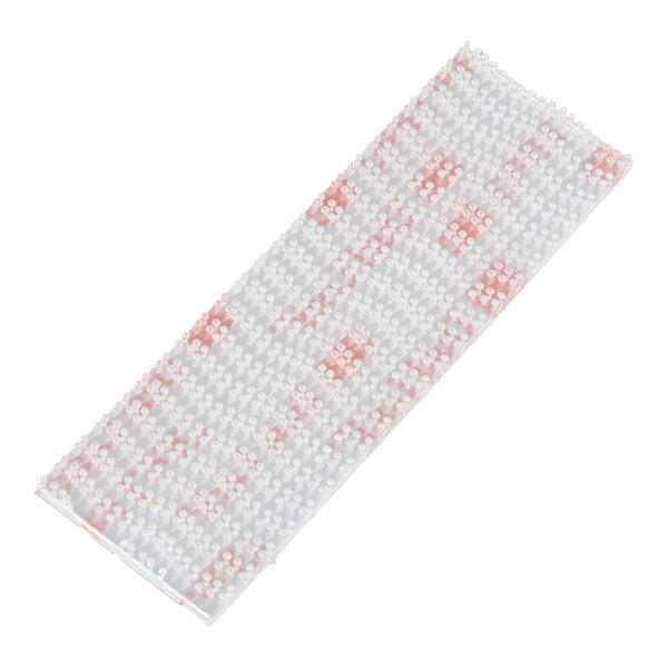 A clear rectangular 3M Scotch Extreme Fastener strip with a textured surface, measuring 3 inches by 1 inch.