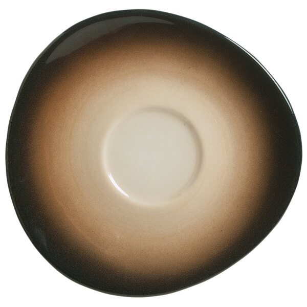 A white porcelain saucer with a brown rim and circular center.