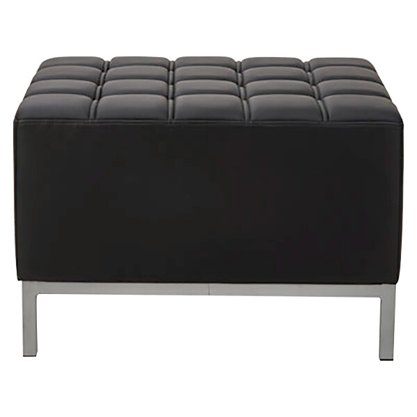 A black ottoman with a square top and metal legs.