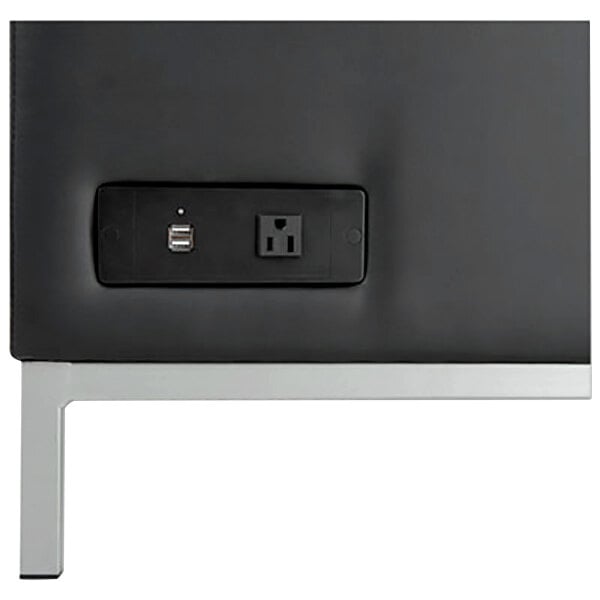 A black rectangular Alera QUB Series sectional piece with a black power outlet on the side.