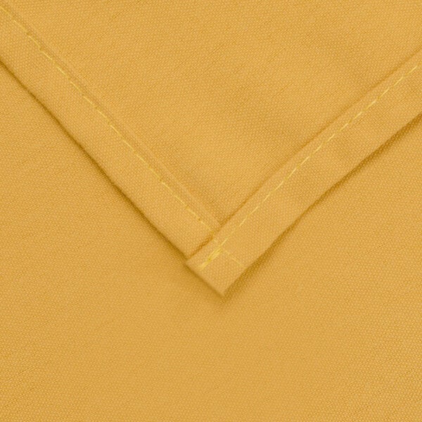 a close up of a yellow fabric