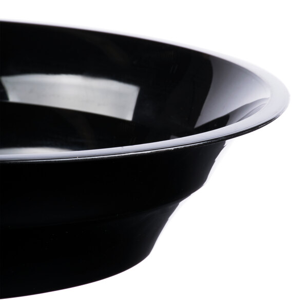 A close up of a black Fineline low profile catering bowl.