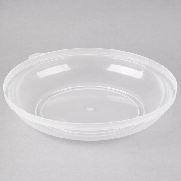 A clear plastic Fineline catering bowl lid on a clear plastic bowl.
