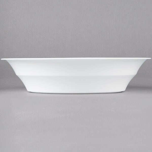 A white Fineline low profile plastic catering bowl.