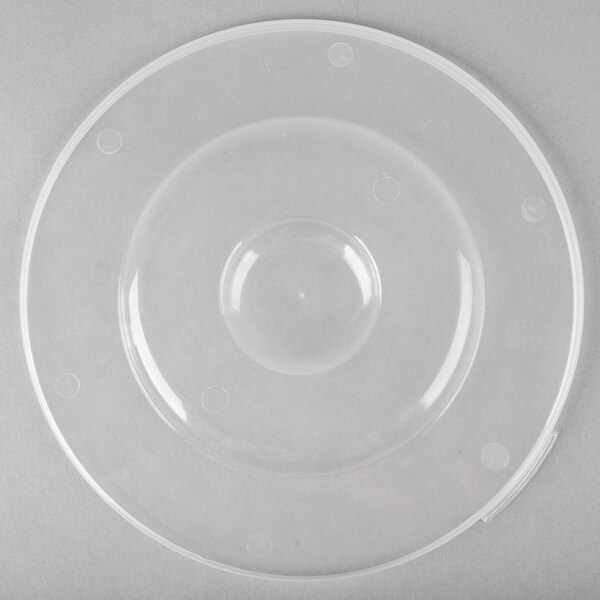 A clear plastic lid for a Fineline clear plastic catering bowl with a white circle in the middle.