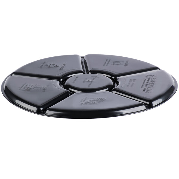 a black circular object with a circular design