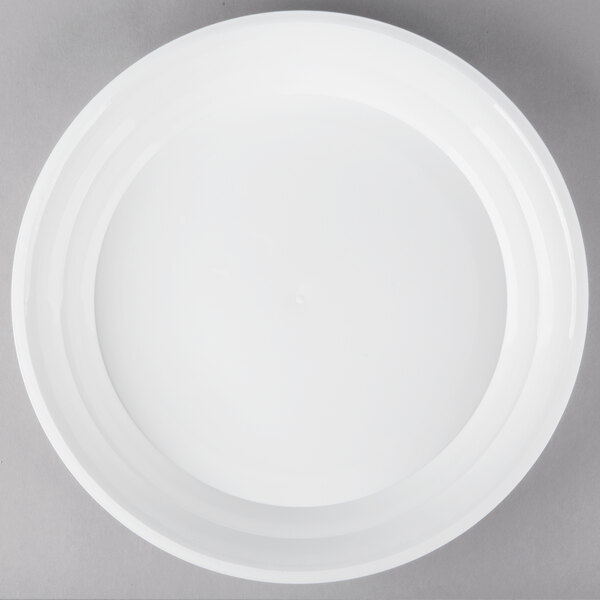 A white Fineline low profile catering bowl with a lid.